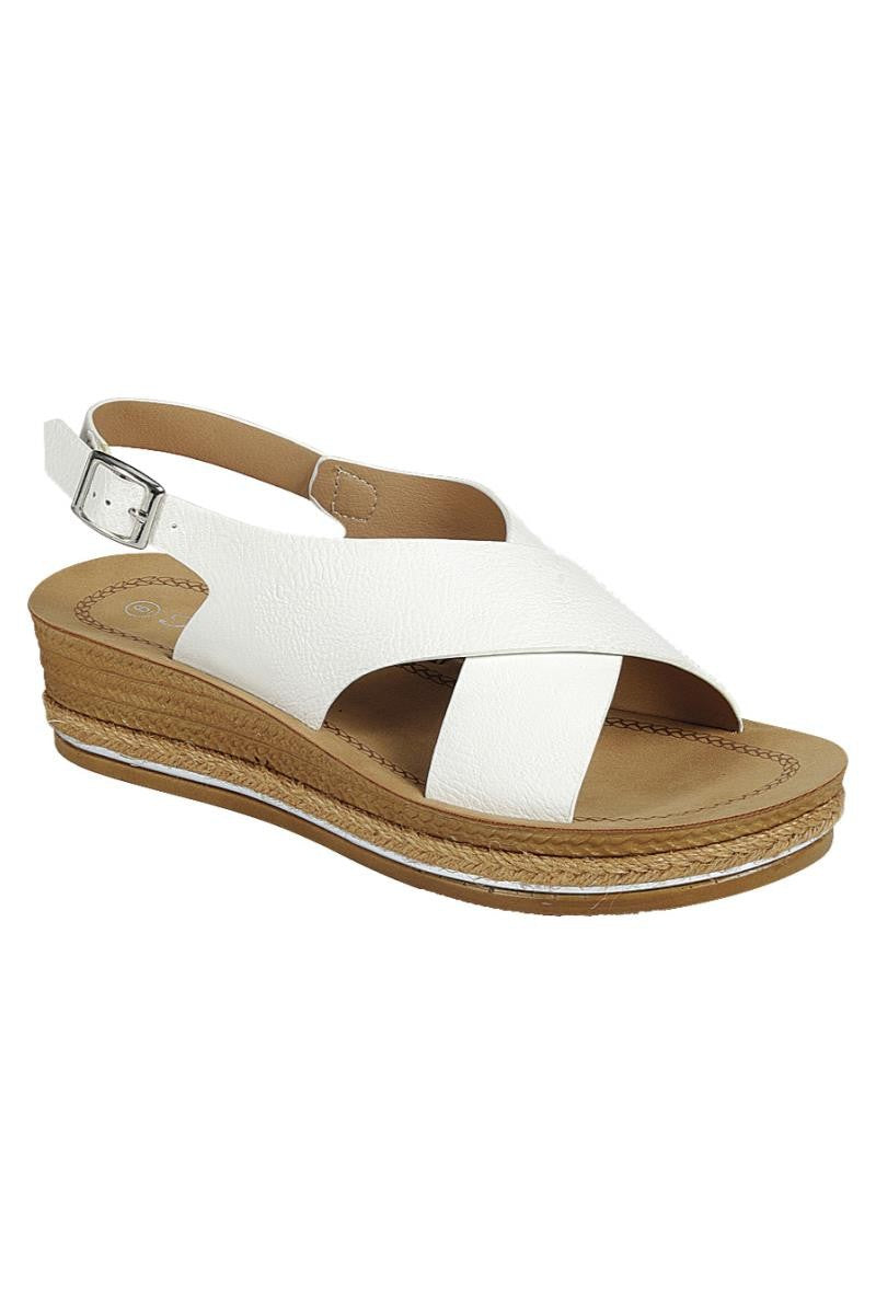 Ankle Platform Sandals with white cross straps and elevated brown sole.