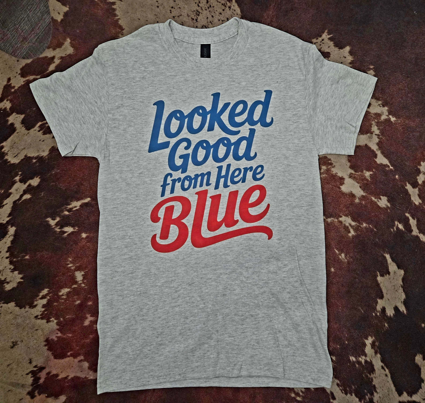 Blue "Looked Good From Here" graphic tee for baseball fans with humorous design