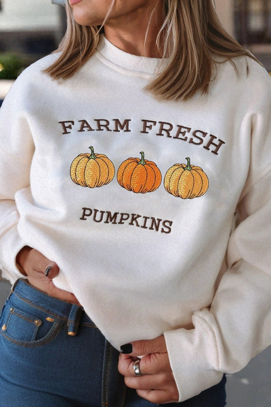 Farm Fresh Pumpkins Sweatshirt - model close up showing embroidery