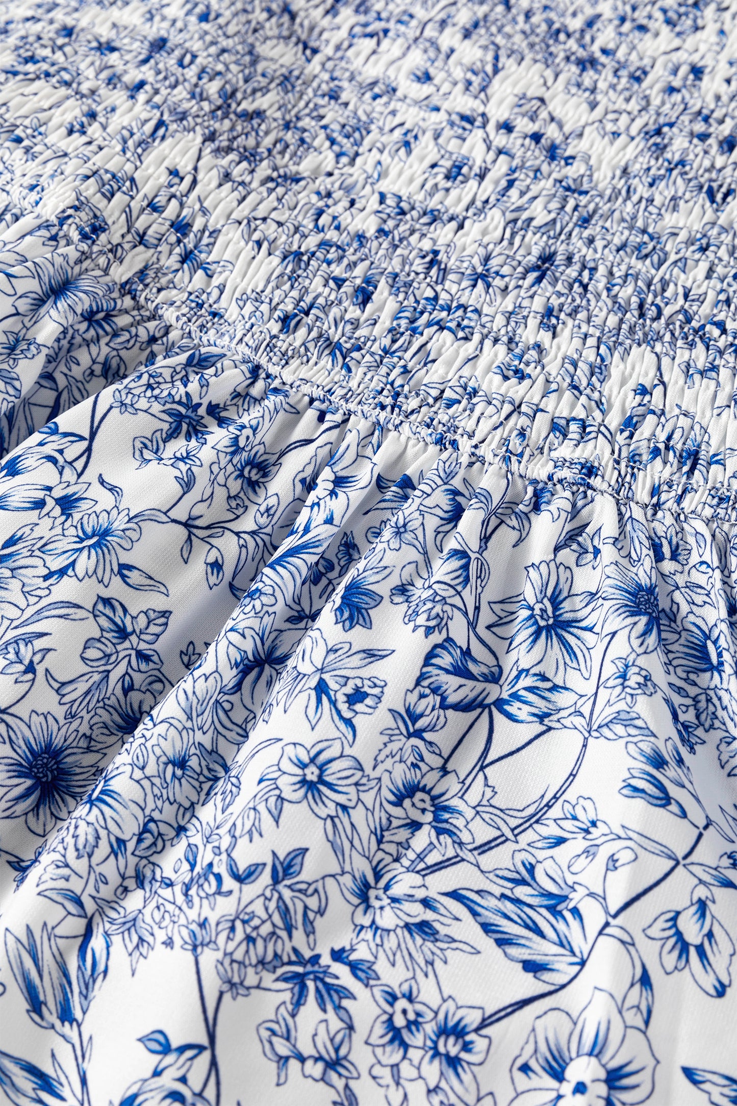 Blue toile floral smocked babydoll blouse - lifestyle shot