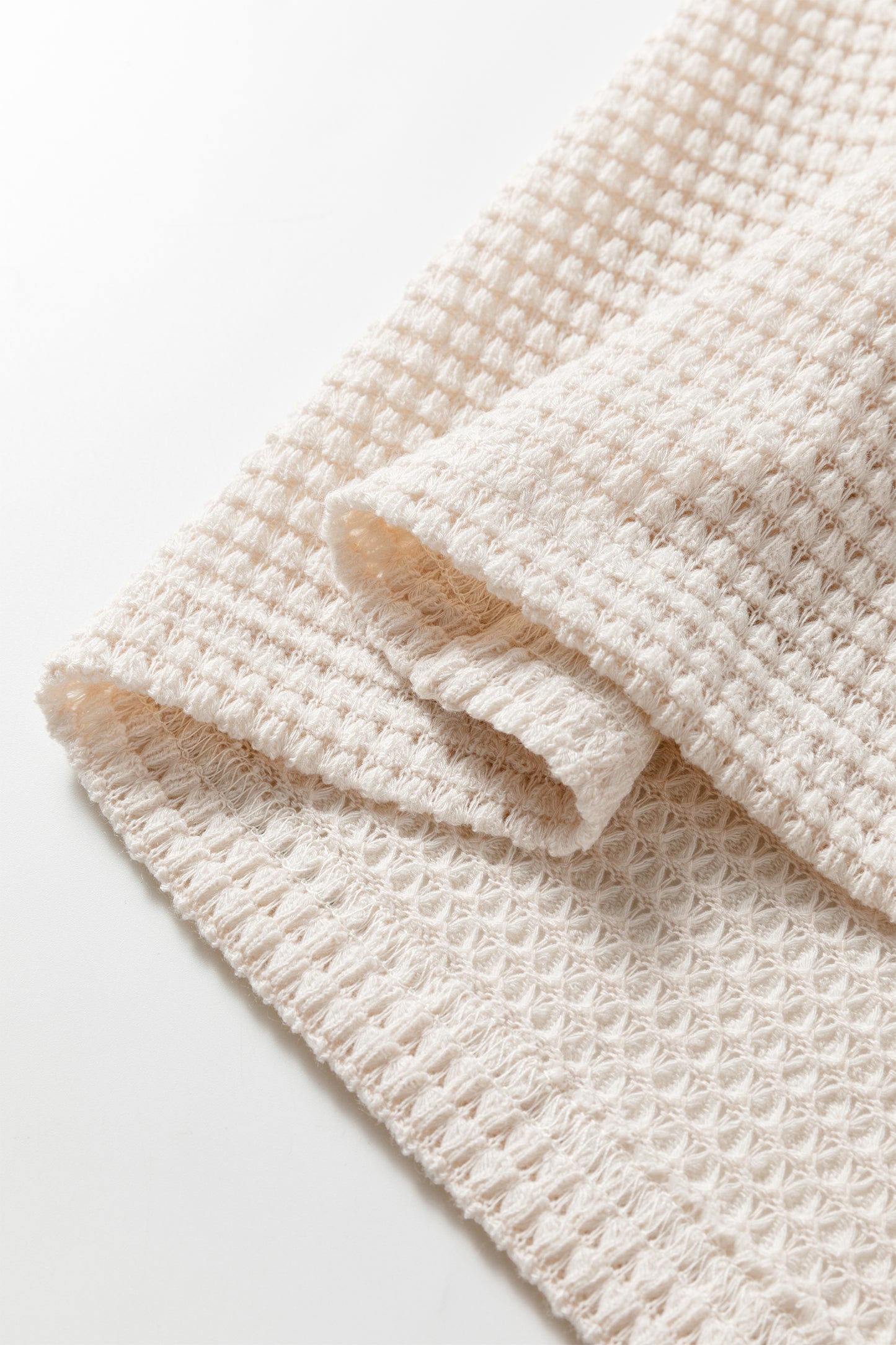 Cream waffle knit cold shoulder top - additional lifestyle shot showing relaxed oversized fit