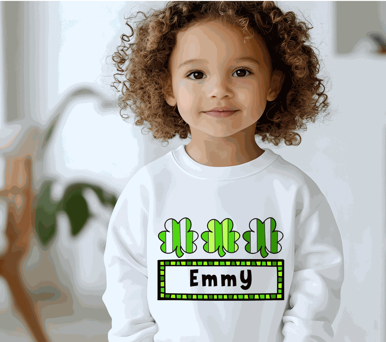 Personalized shamrocks youth shirt with custom name for St. Patrick's Day luck