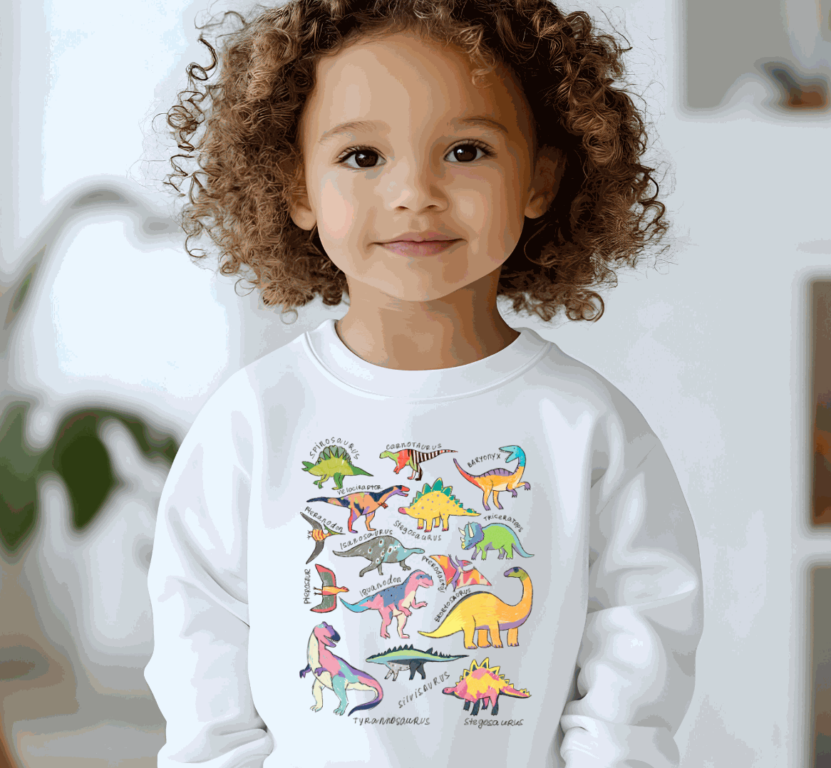 Colorful dinosaurs with names printed on a shirt for dino lovers