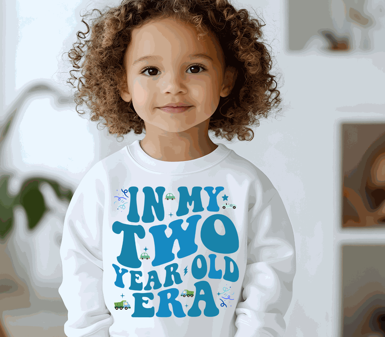 Toddler wearing Era- Cars shirt with colorful car design and vintage style