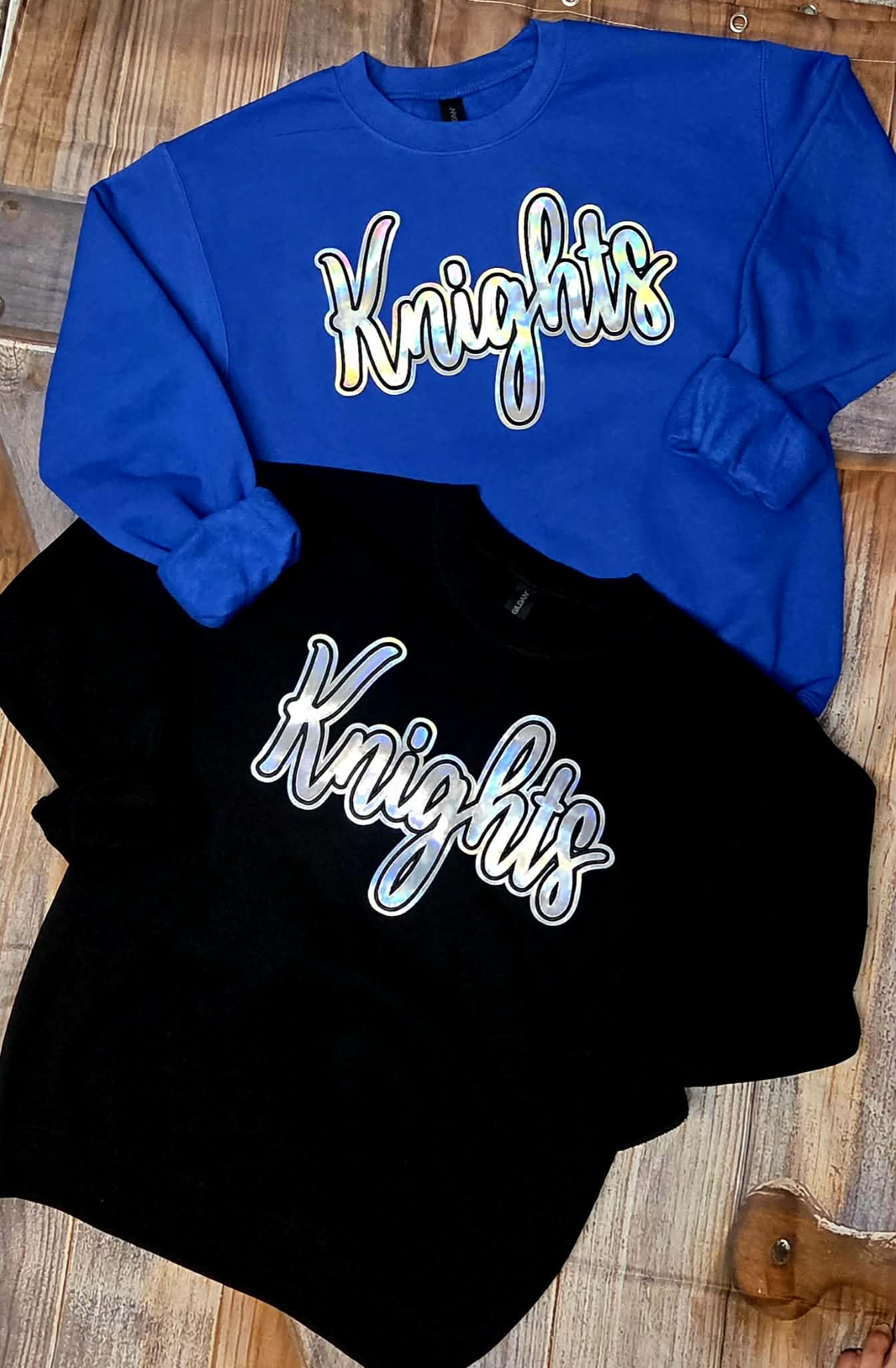 Knights holographic crewneck sweatshirts in royal blue and black