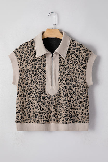 Beige leopard jacquard knit zip collar top - close-up of ribbed hem band and jacquard knit fabric
