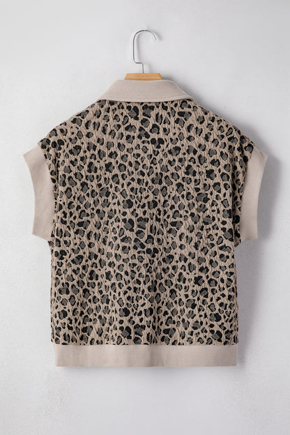Beige leopard jacquard knit zip collar top - close-up of leopard jacquard knit fabric texture detail