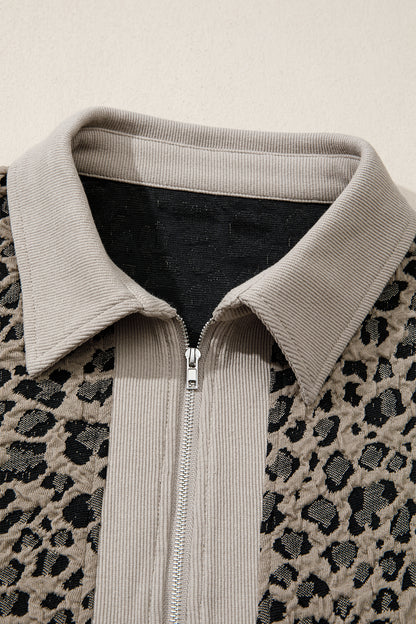 Beige leopard jacquard knit zip collar top - front on model showing relaxed fit and zip collar styling
