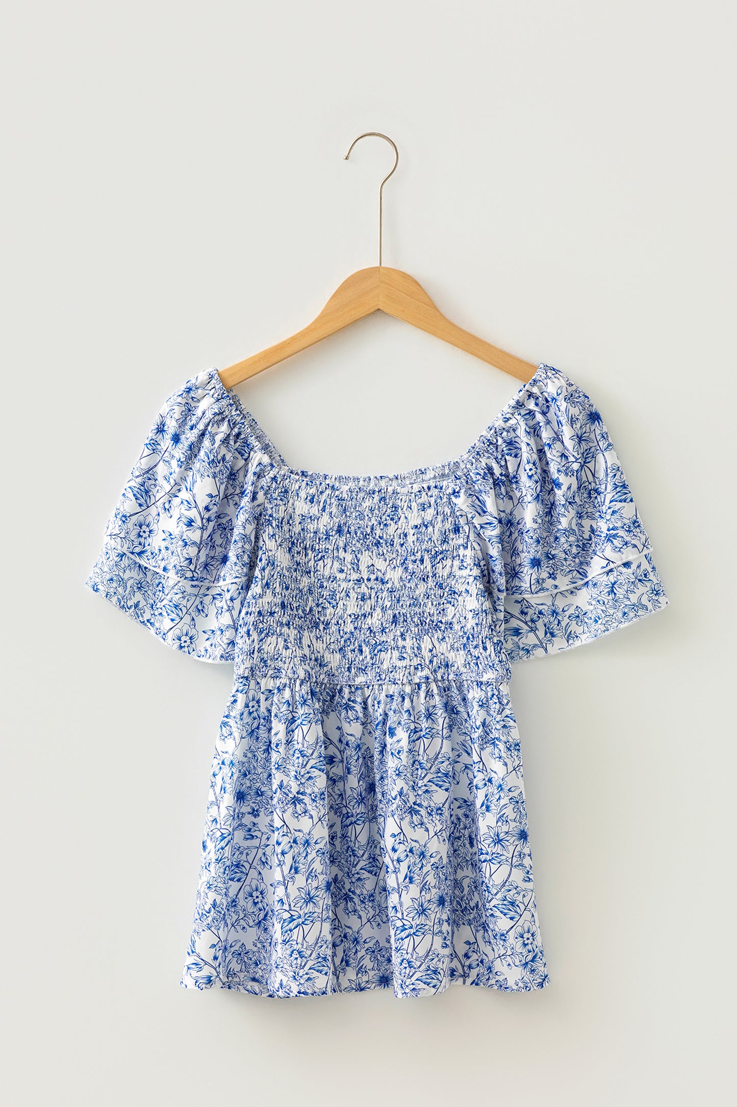 Blue toile floral smocked babydoll blouse - side detail
