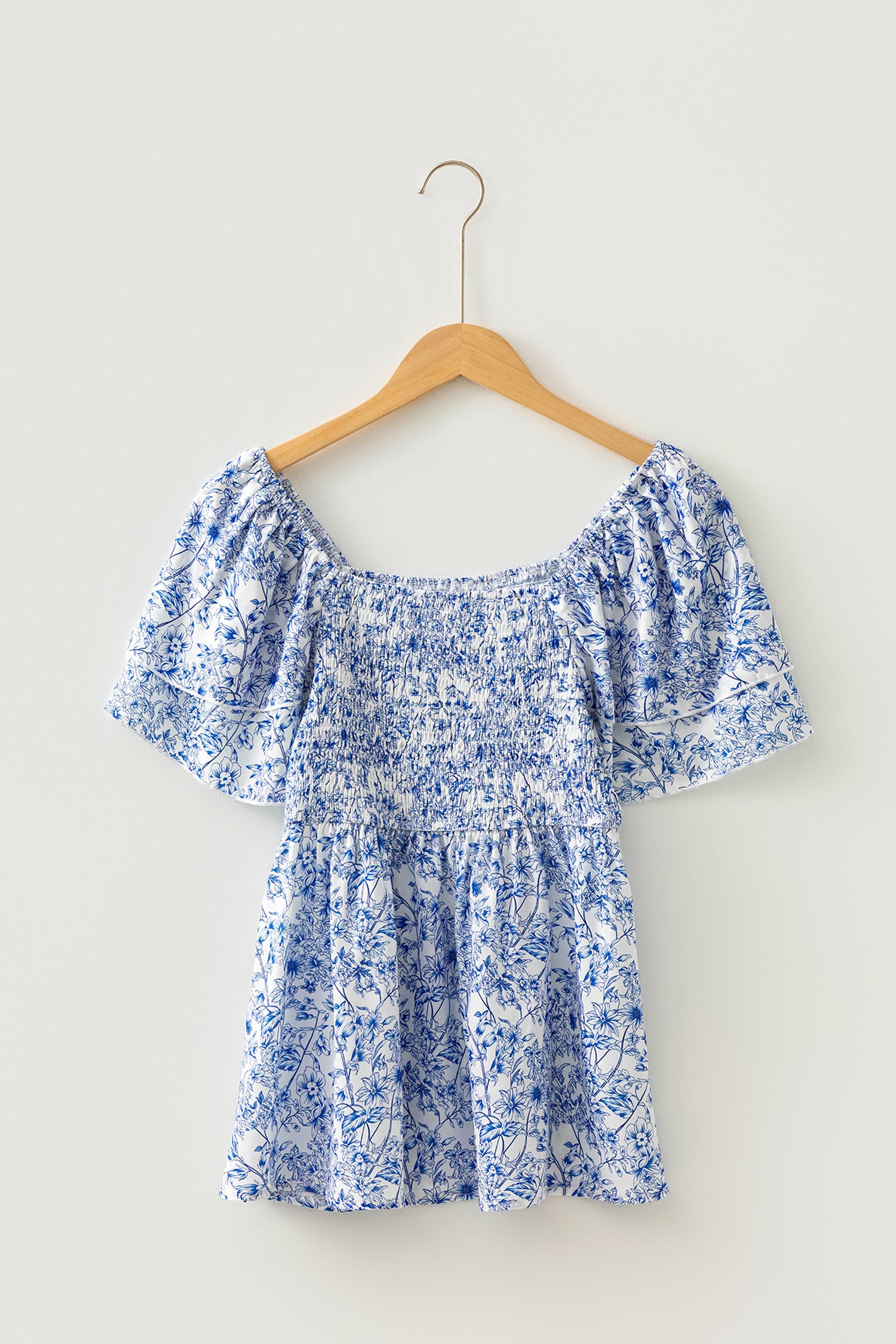 Blue toile floral smocked babydoll blouse - side detail