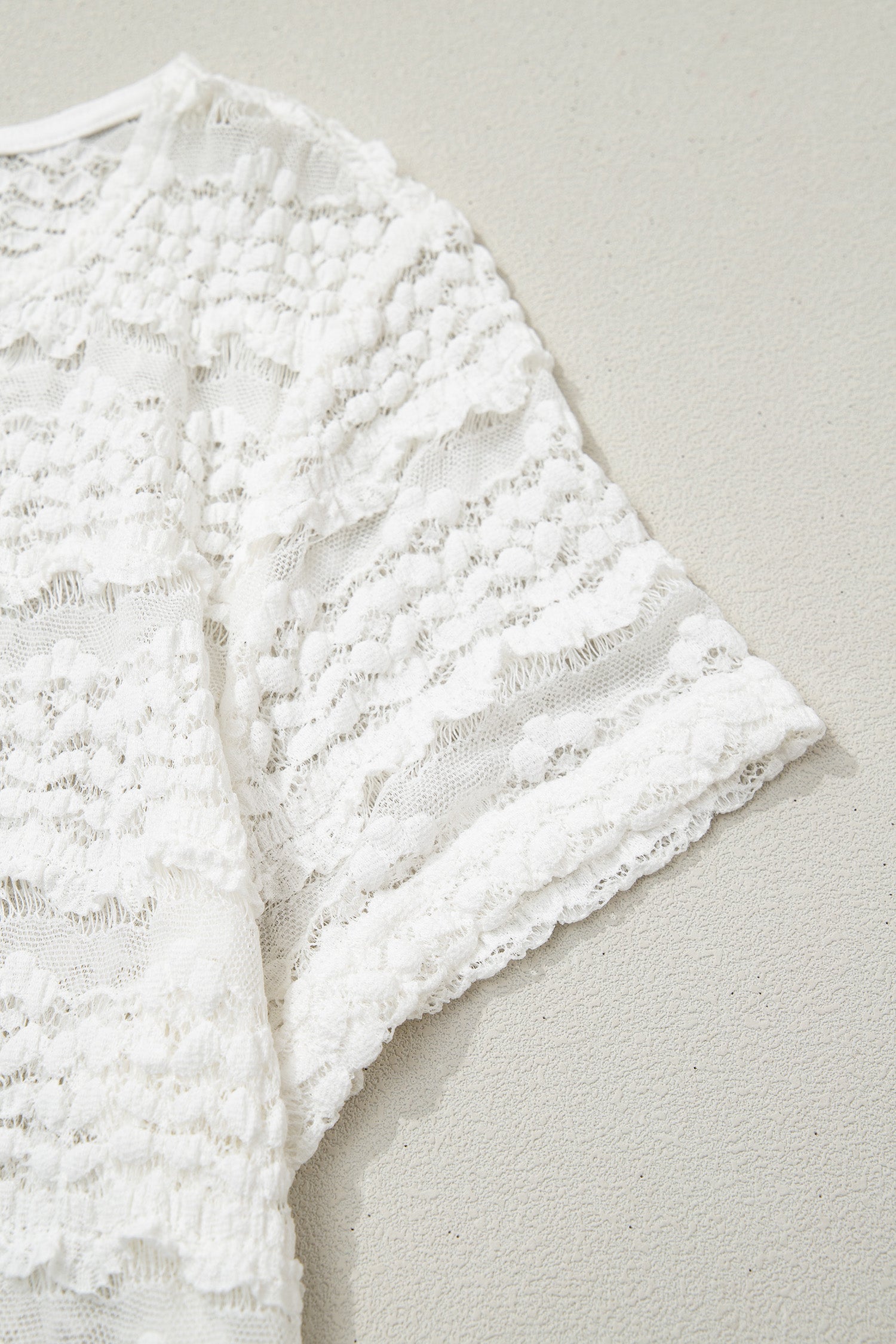 White sheer lace short sleeve top - lace texture close up