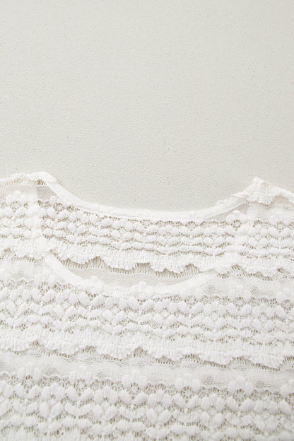 White sheer lace short sleeve top - front view on model close up