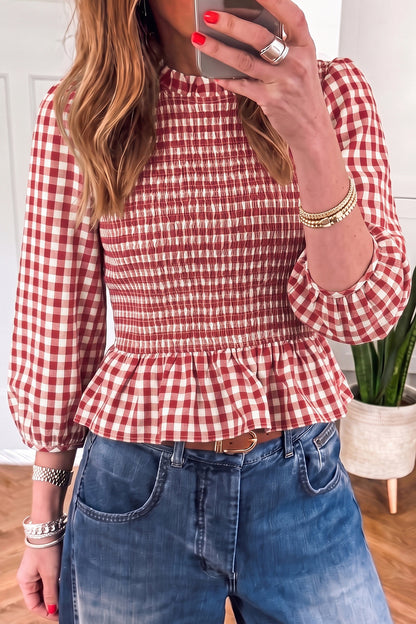 Red and white plaid shirred peplum top styled with jeans