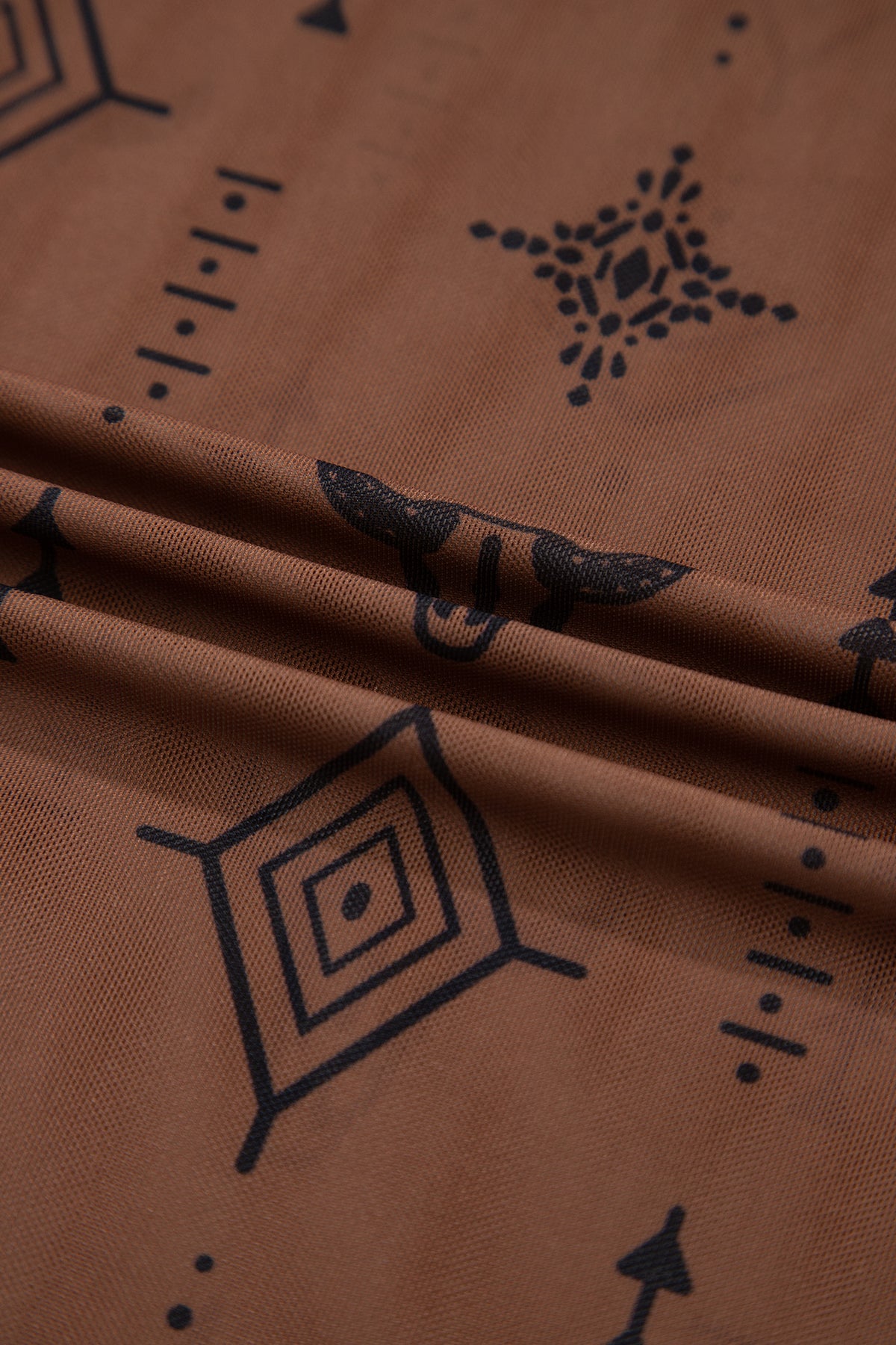 Round neckline and western print detail