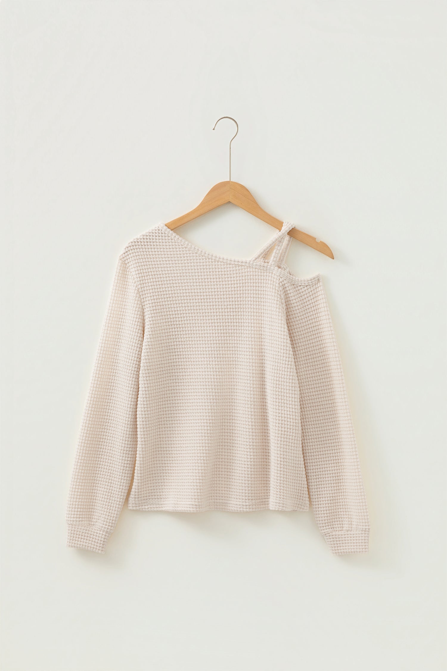 Cream waffle knit cold shoulder top - close-up of self-fabric strap and cold shoulder detail