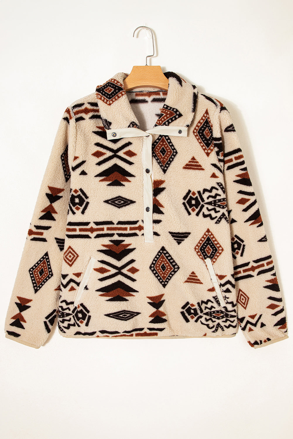 Beige western geometric plush pullover styled with denim