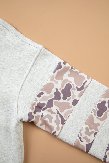 Neutral camo patchwork sleeve detail