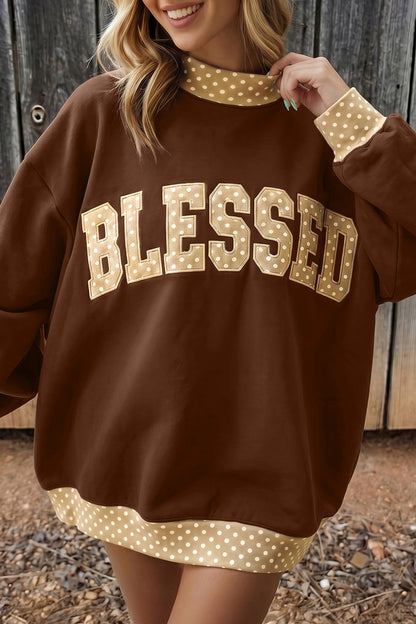 Coffee-brown BLESSED sweatshirt with tan polka-dot lettering and trim