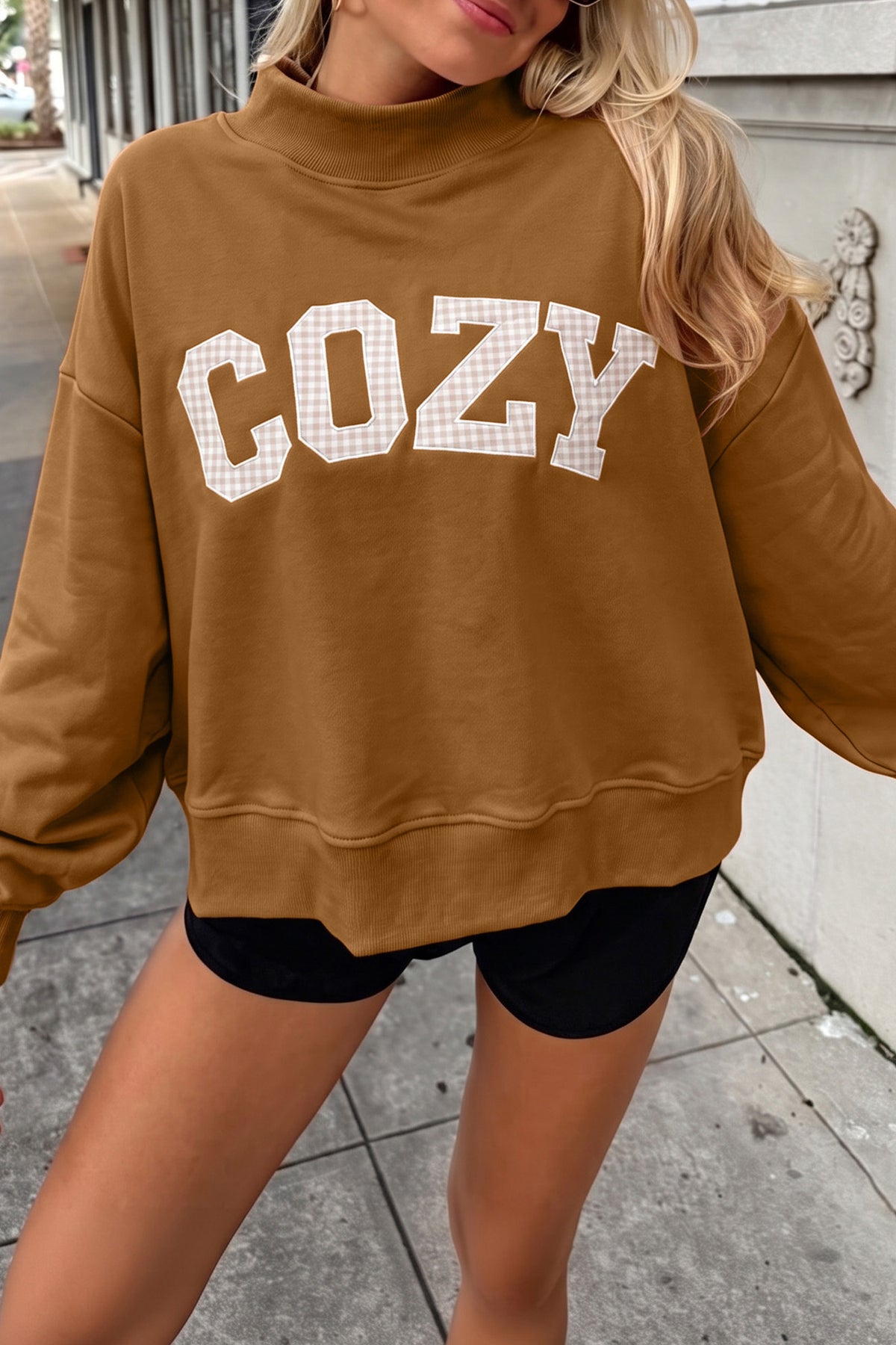 Chestnut COZY gingham letter sweatshirt styled on a model