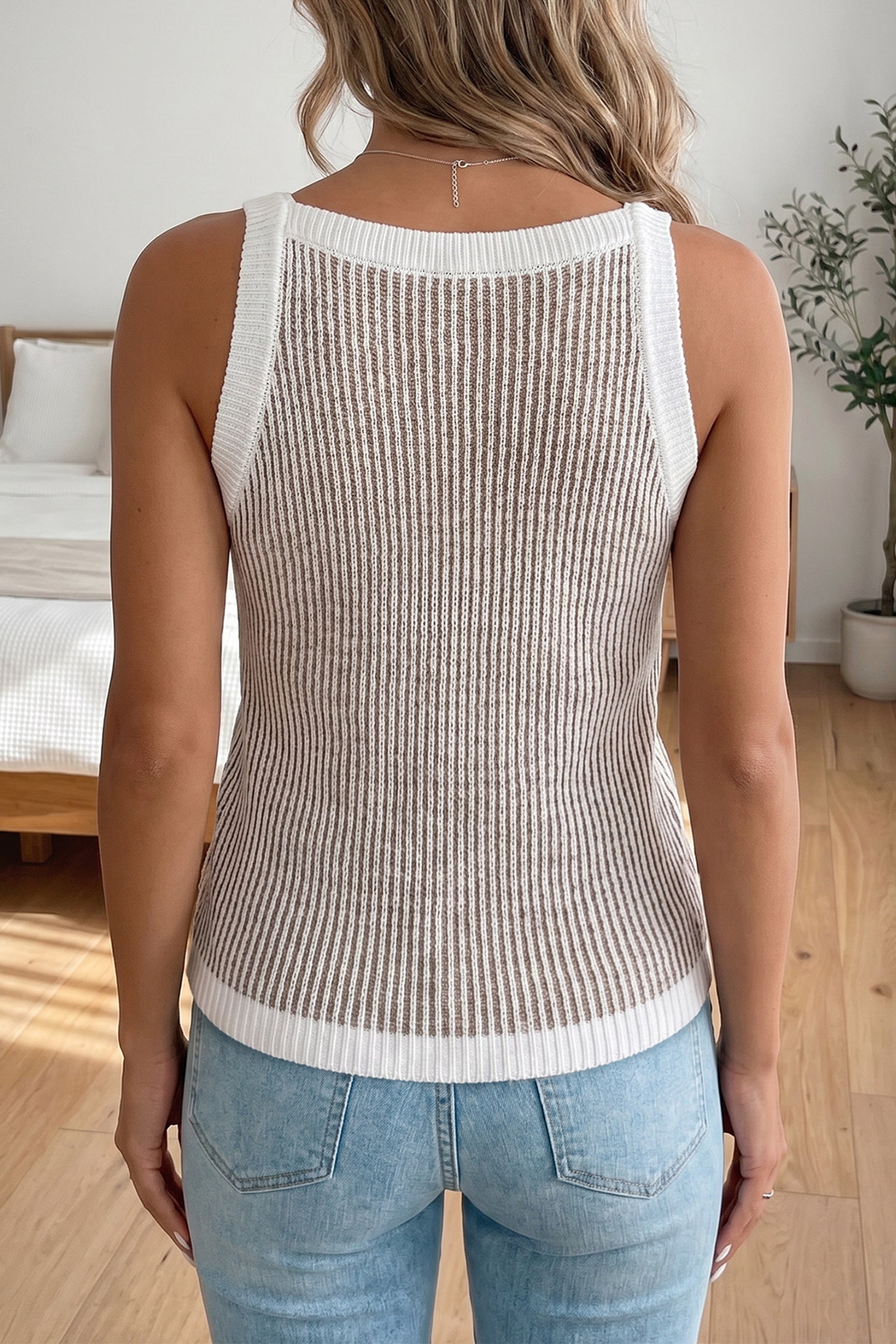 Pale khaki ribbed knit sweater tank - front on model showing full silhouette with gold jewelry styling