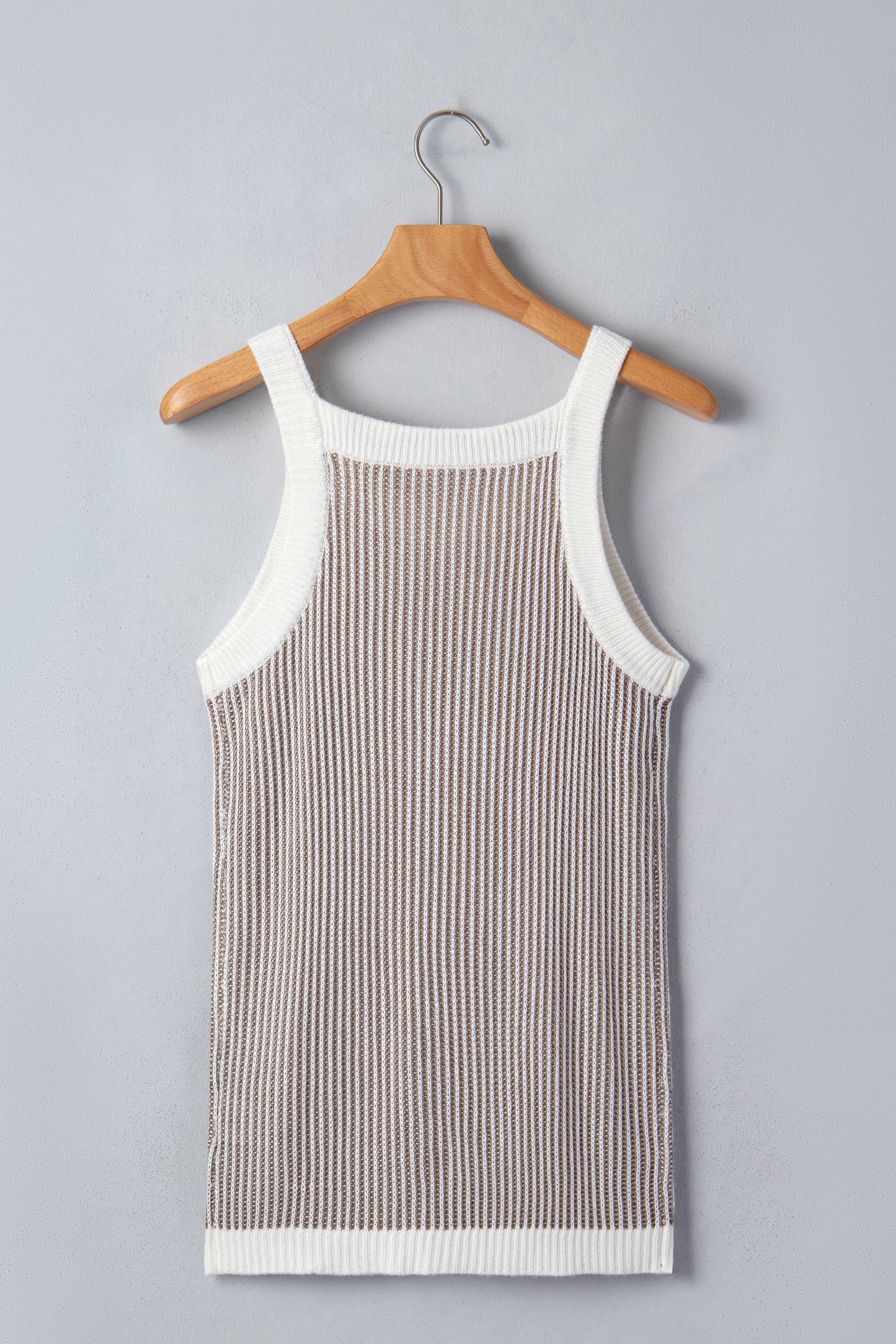 Pale khaki ribbed knit sweater tank - back on model with jeans showing contrast white trim detail throughout