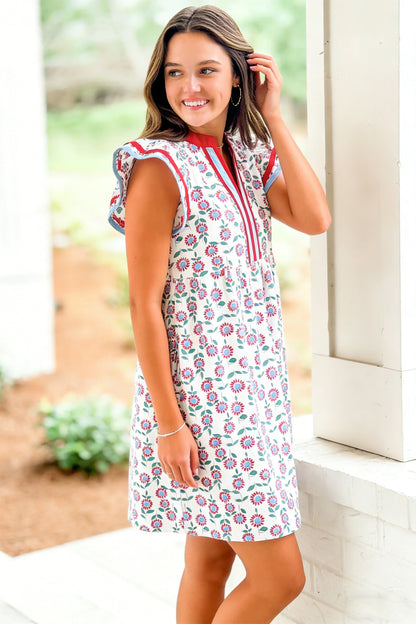 Red floral contrast trim flutter sleeve mini dress - front flat lay on hanger showing full dress and contrast trim detail