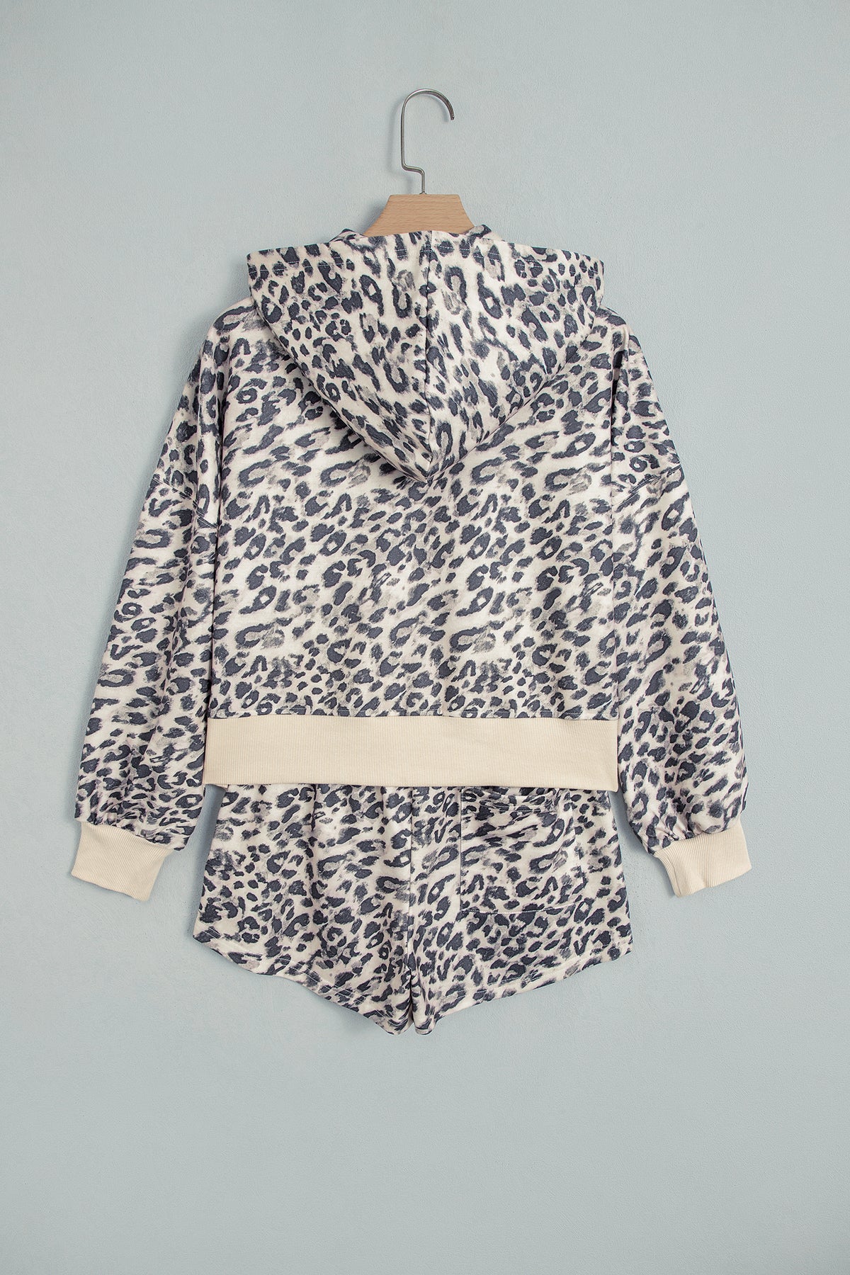 Back view of leopard hooded jacket and matching shorts
