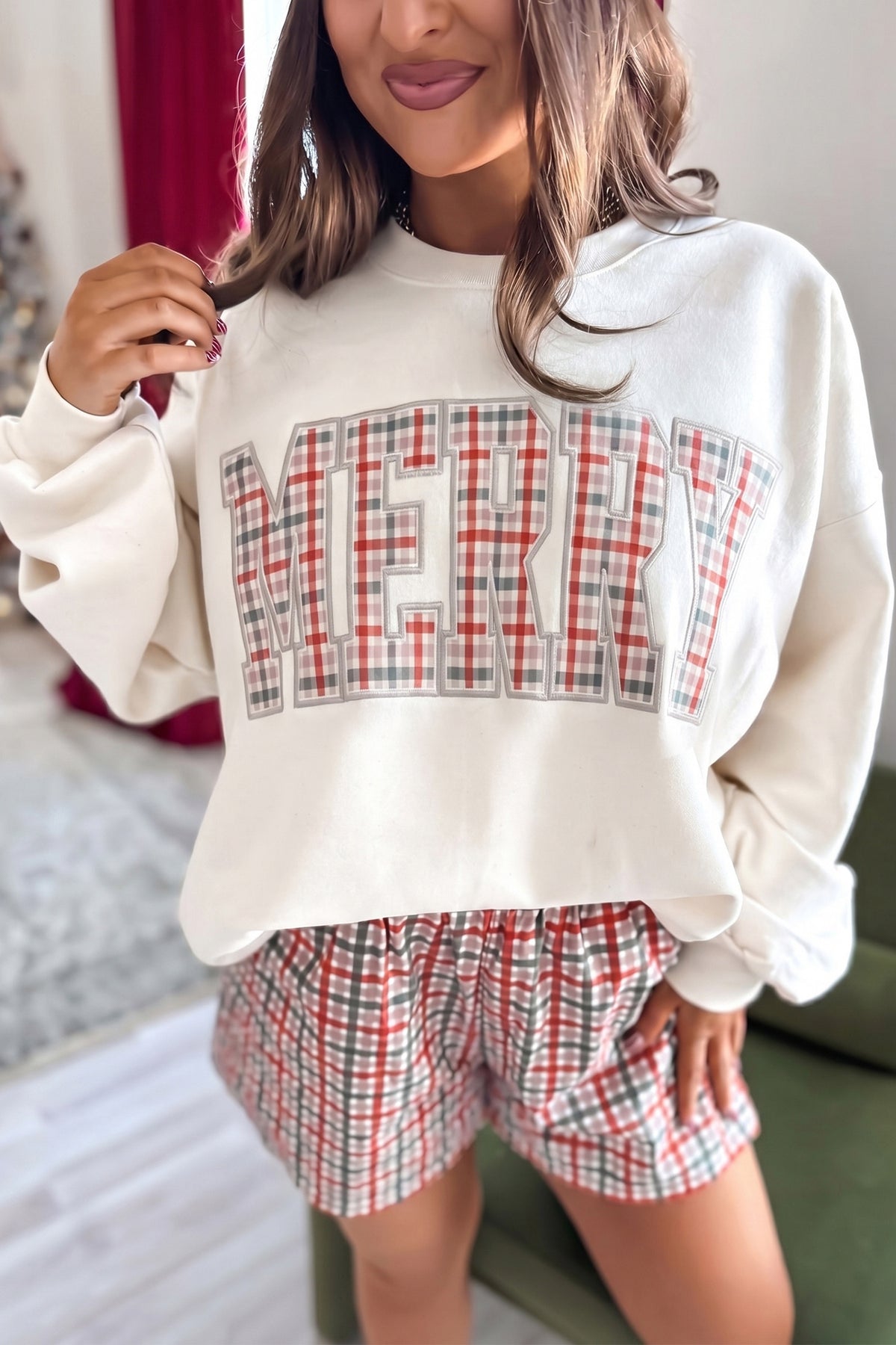 Front view of white MERRY top and coordinating plaid shorts