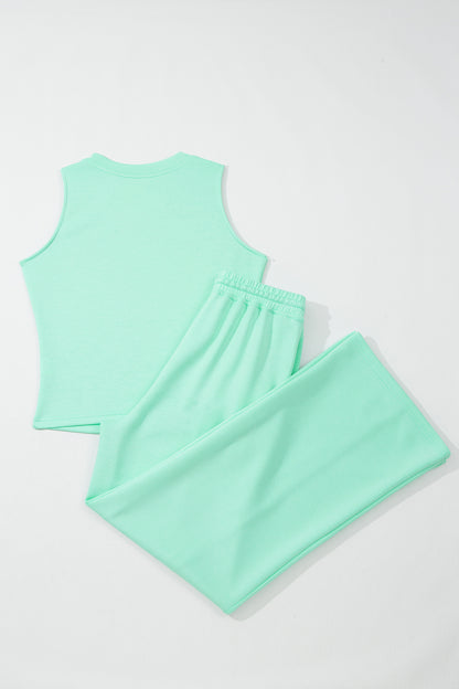 Moonlight jade two piece set - close-up of elastic waistband with drawstring tie and deep side pocket with phone