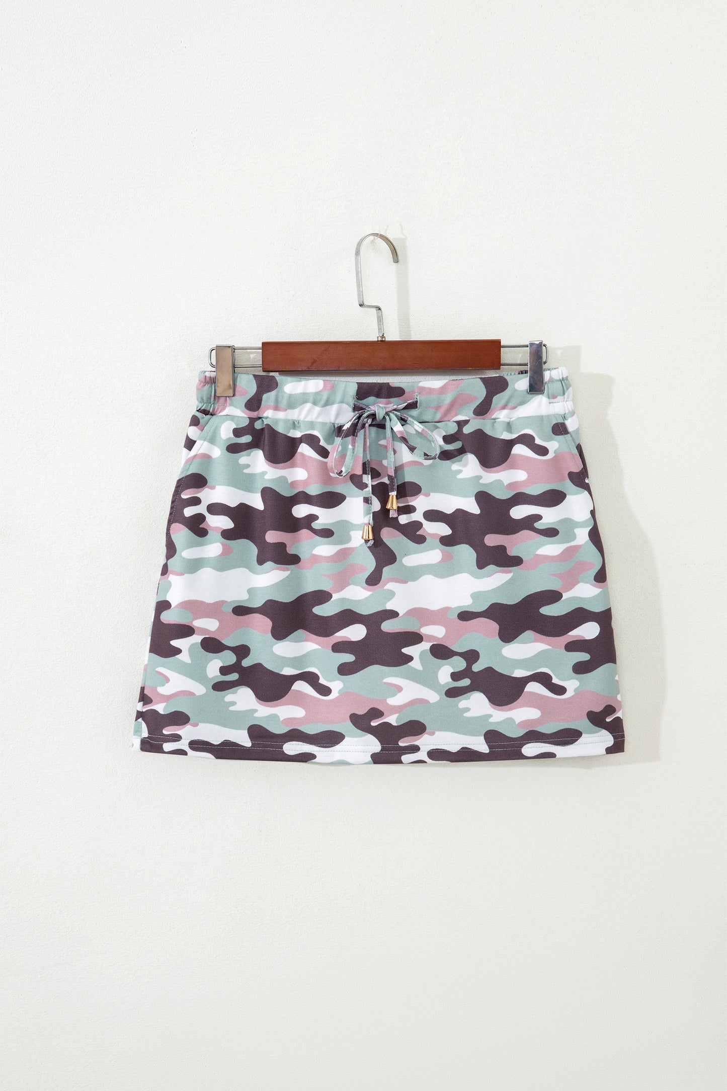 Green camouflage mini skort detail view