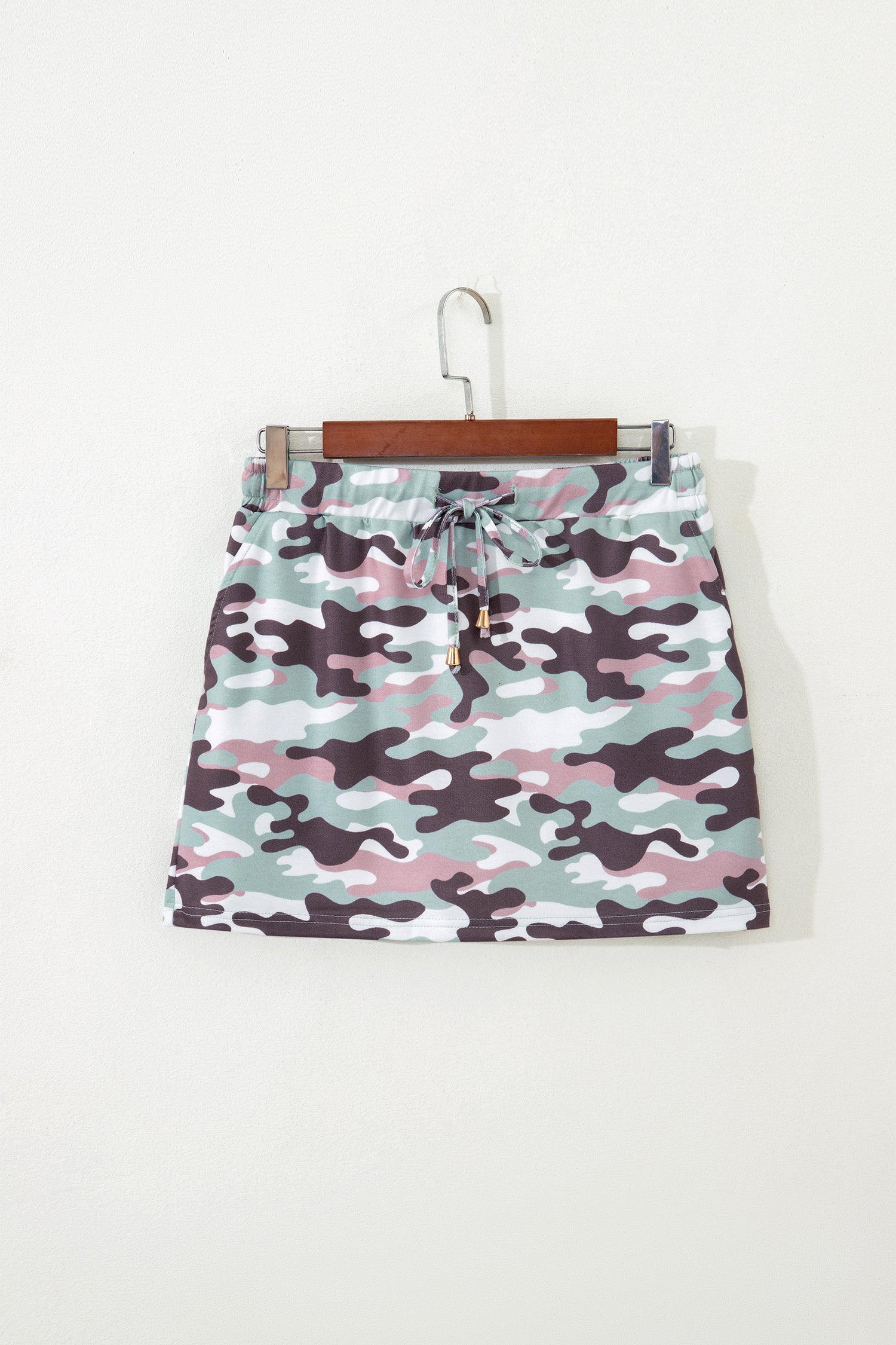 Green camouflage mini skort detail view