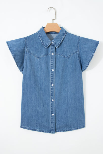 Dusk blue ruffle sleeve denim shirt - front close-up on model showing Western yoke stitching and snap buttons