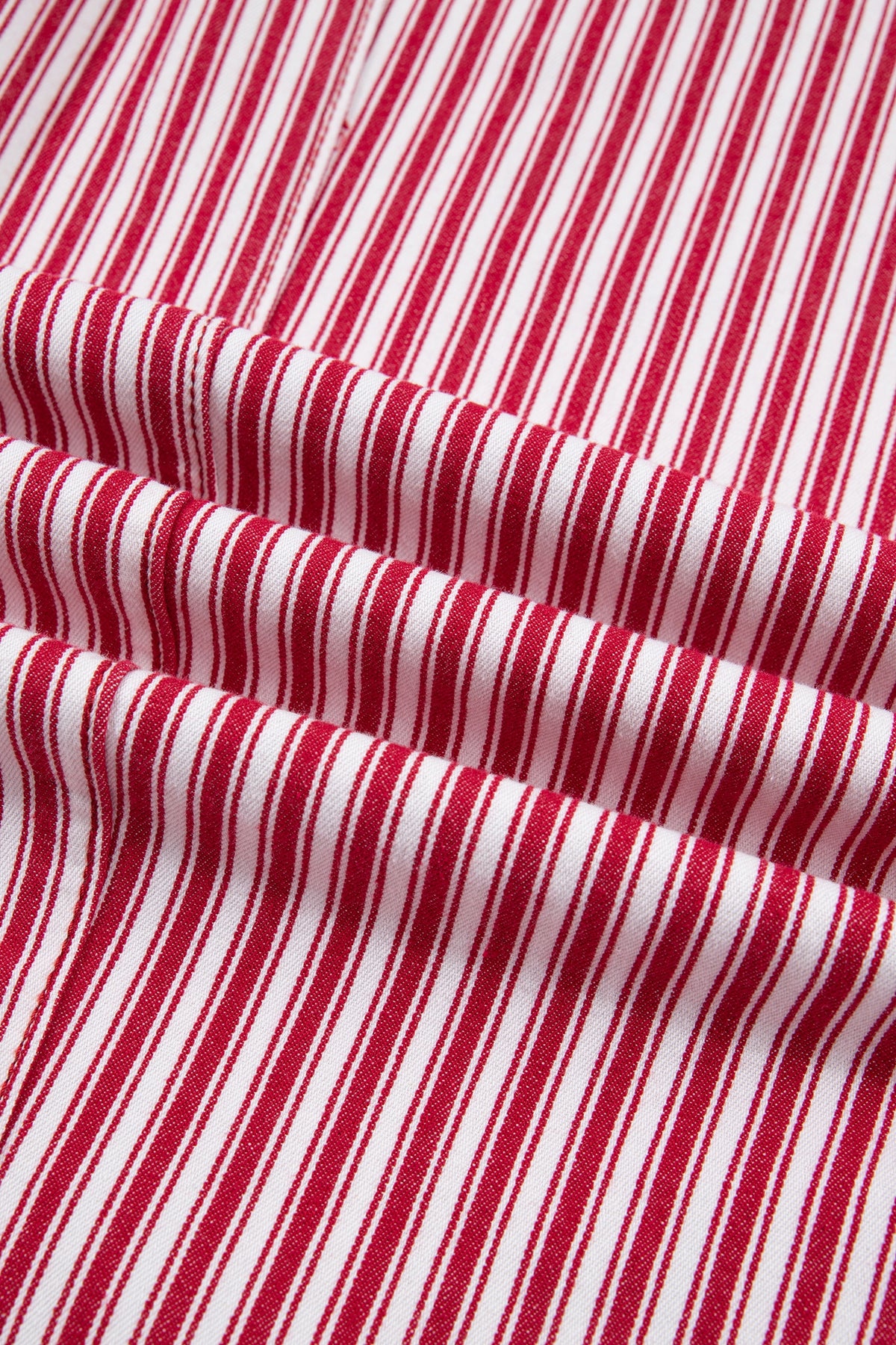 Red stripe cotton pants styled with sneakers
