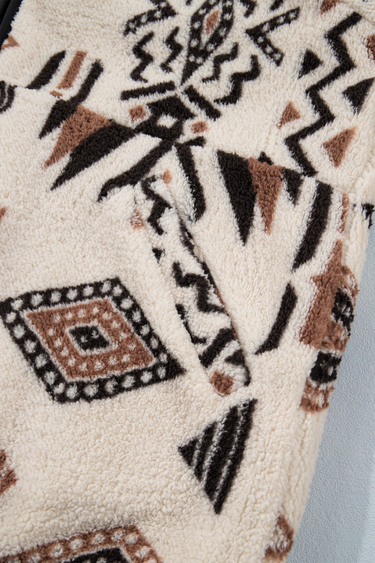 Back view of geometric fleece jacket