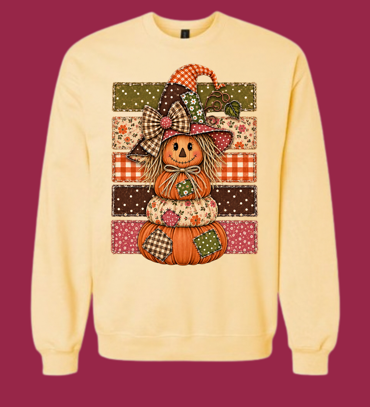 Pale yellow sweatshirt with patchwork pumpkin witch graphic